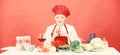 Housewife cook crying while cutting onion. Slice and chop onion. Stinging eyes and tears cutting onions. Suffer but keep Royalty Free Stock Photo