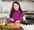 Housewife cooking fish pie with salmon Royalty Free Stock Photo