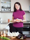 Housewife cooking fish pie with salmon Royalty Free Stock Photo