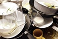 A lot of dirty dishes in the sink after dinner. Need for a dishwasher and cleaning lady Royalty Free Stock Photo