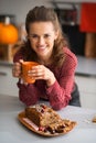 Housewife drinking tea with freshly pumpkin bread Royalty Free Stock Photo