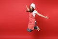 Housewife female chef cook or baker in striped apron white t-shirt, toque chefs hat isolated on red wall background