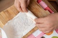 Housewife making putting cheese in yufka, make traditional Turkish sigara boregi cigarette borek