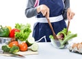 Housewife making salad for dinner