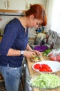 Housewife making salad