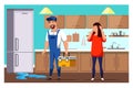 Housewife and repairman on kitchen near fridge Royalty Free Stock Photo