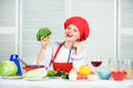 Housewife daily routine. Girl adorable chef. Housewife cooking and drink wine. Enjoy easy ideas for dinner. Woman enjoy Royalty Free Stock Photo