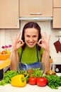 Housewife showing ok signs with both hands