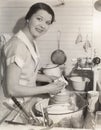 Housewife washing dishes