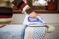 Housewife work, a housewife does her job,iron and ironing board, ironing Royalty Free Stock Photo
