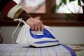 Housewife work, a housewife does her job,iron and ironing board, ironing Royalty Free Stock Photo