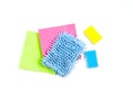 Housework, housekeeping, household, cleaning service concept. Multicolored rags and sponges on white background