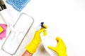 Housework, housekeeping, household, cleaning service concept. Cleaning spray mop, rags, sponges and woman hands in