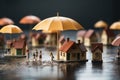 Housing insurance symbolized by wooden house model and umbrella-carrying individuals Royalty Free Stock Photo