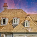 Housing Market Custom Home New Cedar Shake Roof Pink Sunset Sky Background Royalty Free Stock Photo