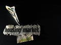 Housing Market newspaper headlines with graph and crashing dollar airpane Royalty Free Stock Photo