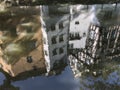 Housing reflection in the regnitzarm river Royalty Free Stock Photo