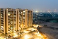 Housing skyscrapers in gurgaon at dusk with skyline