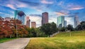 Houston Texas modern skyline at sunset twilight from park lawn Royalty Free Stock Photo