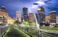 Houston Texas modern skyline at sunset twilight from park lawn Royalty Free Stock Photo