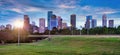 Houston Texas modern skyline at sunset twilight from park lawn Royalty Free Stock Photo