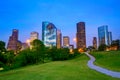 Houston Texas modern skyline at sunset twilight from park