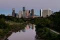 Houston, Texas skyline reflected in Buffalo Bayou after sunset