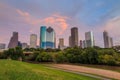 Houston Texas skyline at sunset twilight from park lawn Royalty Free Stock Photo