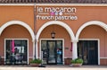 Le Macaron french pastries storefront exterior in Vintage Park, Houston, TX.