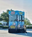 Patsco Windshield Repair business kiosk booth in a commercial parking lot in Houston, TX.