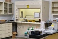 Science laboratory interior from doorway entrance with various scientific equipment and tools.