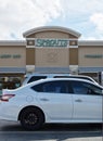 Sprouts Farmers Market business storefront exterior and parking lot in Houston, TX.