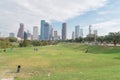 Asian toddler boy enjoy outdoor activities at Eleanor Tinsley park downtown Houston