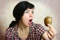 Houswife prepare to peel sprouted potato Royalty Free Stock Photo