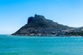 Hout bay Harbor and Chapman`s peak Mountain Royalty Free Stock Photo