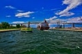Houtmanngracht freighter from Amsterdam passes through the soo locks near a tourist boat Royalty Free Stock Photo
