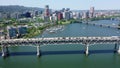 hover above Willamette River in front of Marquam Bridge