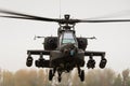 A hovering Apache attack gunship helicopter Royalty Free Stock Photo