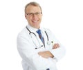 How can I help you with your health. Studio portrait of a smiling doctor standing with his arms crossed isolated on Royalty Free Stock Photo