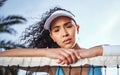 How did I lose. an attractive young woman leaning on a tennis net and looking disappointed after practice. Royalty Free Stock Photo