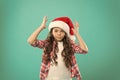 How do i look. Winter spirit. New year party. Santa claus fancy kid. Little girl child in santa hat. Happy winter