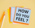 How Do You Feel question text on colorful paper, concept background