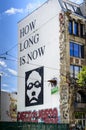 How long is now graffiti on a building wall in Berlin