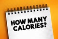 How Many Calories? text on notepad, concept background Royalty Free Stock Photo