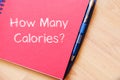 How many calories write on notebook Royalty Free Stock Photo