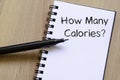 How many calories write on notebook Royalty Free Stock Photo