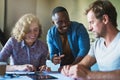 How a mobile app is born. a diverse group of businesspeople collaborating on a project in a modern office. Royalty Free Stock Photo