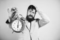 How much time left till deadline. Time to work. Man bearded stressful businessman hold clock. Stress concept. Hipster