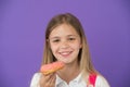 How tame childs sweet tooth. Kid rewarded for good behavior with sugary treats. Girl cute smiling face holds sweet donut Royalty Free Stock Photo