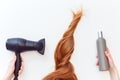 How to care for your hair using a hair dryer. which shampoo to choose. Red hair and woman holding hair dryer and shampoo bottle on